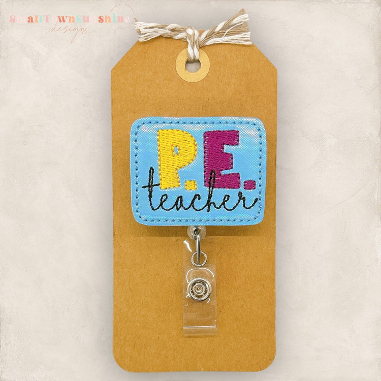 P.E Teacher Badge Topper