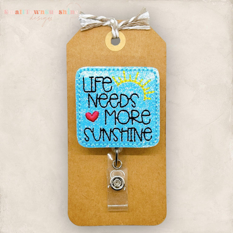 life needs more sunshine embroidered badge reel
