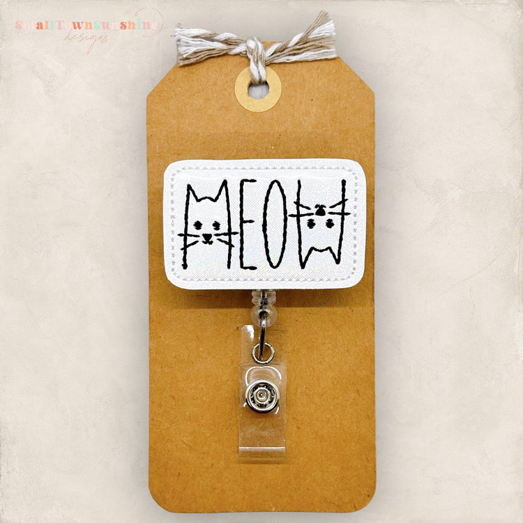 meow with cat faces badge reel