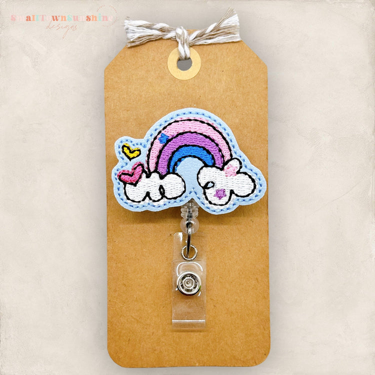 doodle rainbow with clouds and hearts badge reel