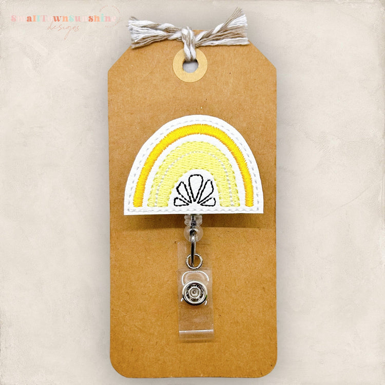 lemon slice rainbow badge reel