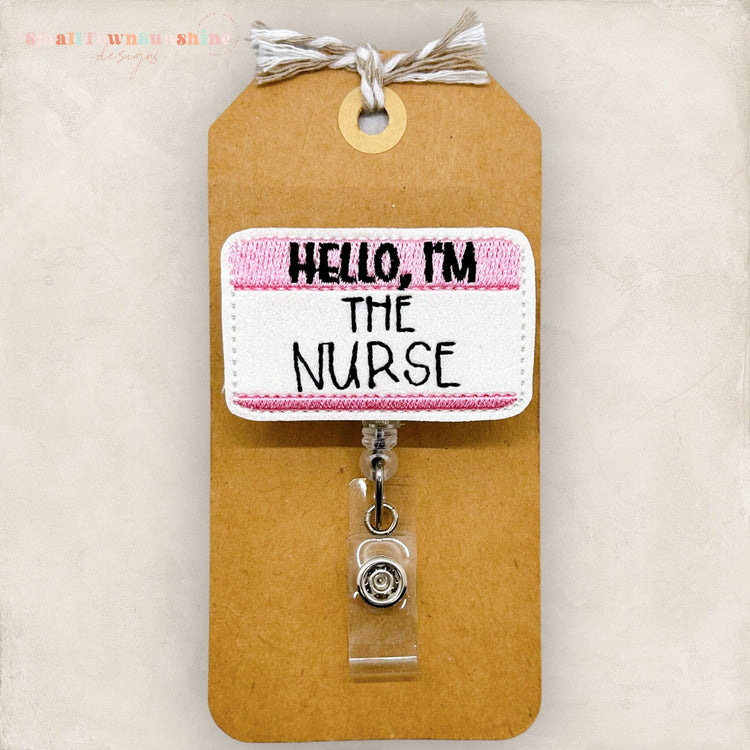 hello I'm the nurse pink name tag badge reel