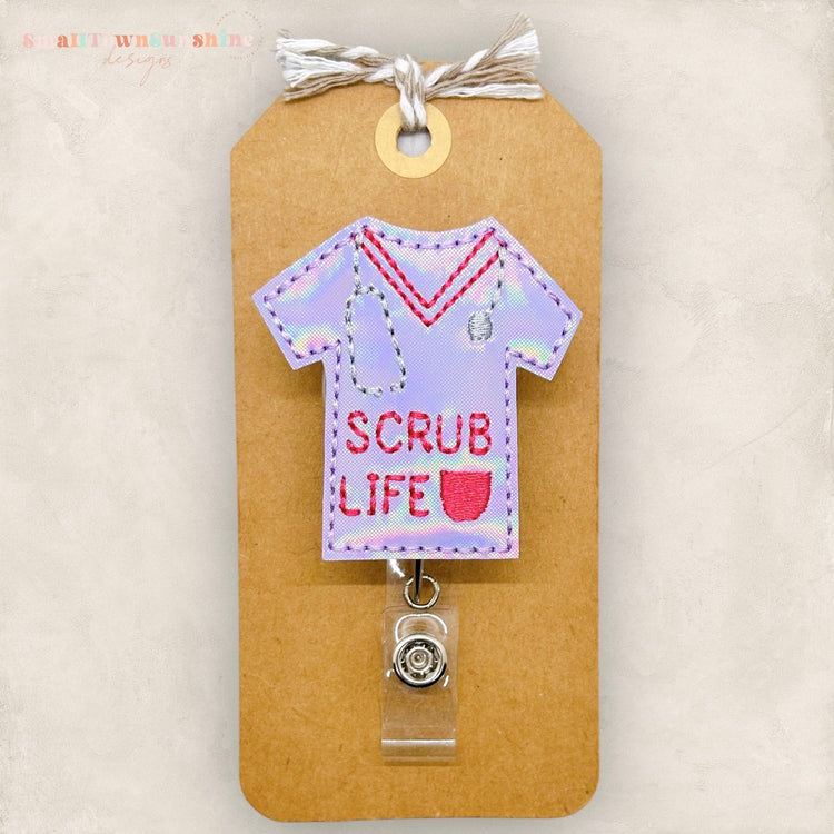 purple scrub top with words scrub life badge reel