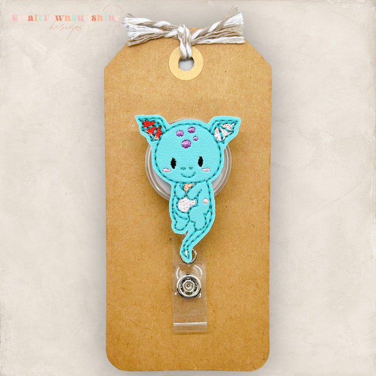 teal dragon badge reel