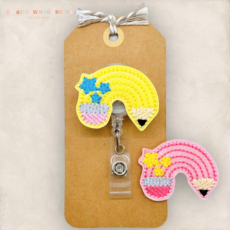 pink or yellow pencil rainbow badge reel