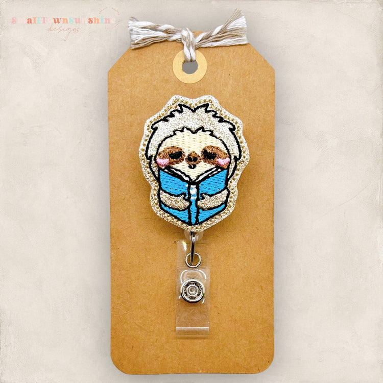 sloth hugging book badge reel