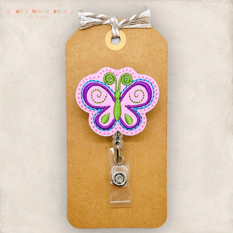 butterfly badge reel