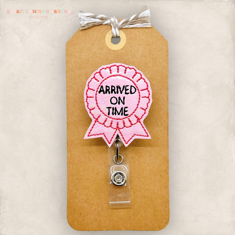 pink arrived on time participation award badge reel
