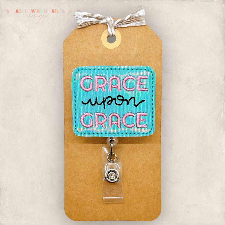 grace upon grace embroidered badge reel