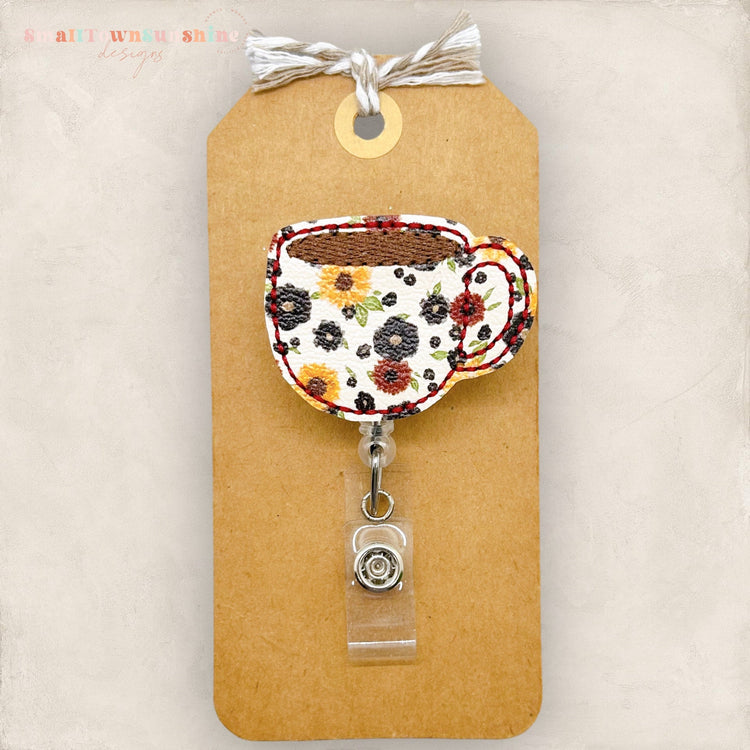 floral coffee mug badge reel