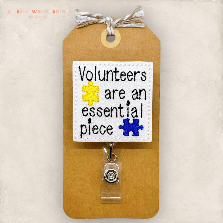 volunteers are an essential piece embroidered badge reel