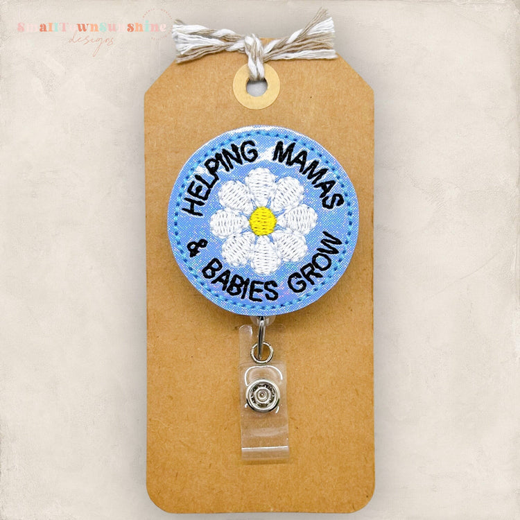 helping mamas and babies grow with a daisy in the center badge reel