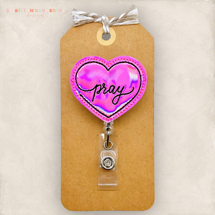 pray heart stitched on pink holographic vinyl badge reel