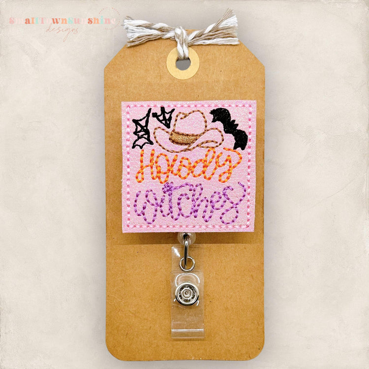 pink cowboy hat howdy witches badge reel