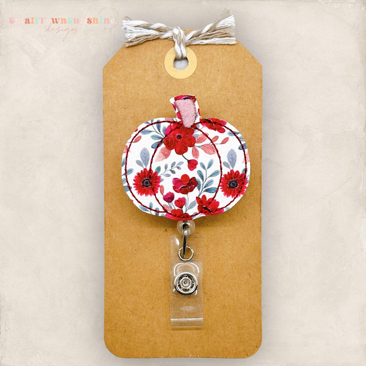 gorgeous wine colored floral print, pumpkin badge reel
