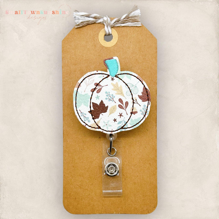 fall leaf print, teal and brown leaves pumpkin badge reel