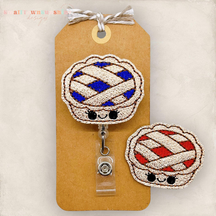 kawaii pie badge reel, criss cross pie crust topping for a badge reel cover, blue or red pie