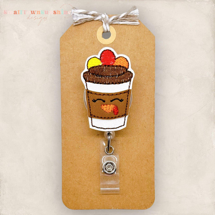 coffee cup with turkey face and tail feathers badge reel cover