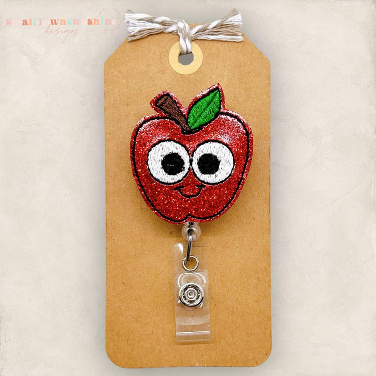 googly eyed apple badge reel topper