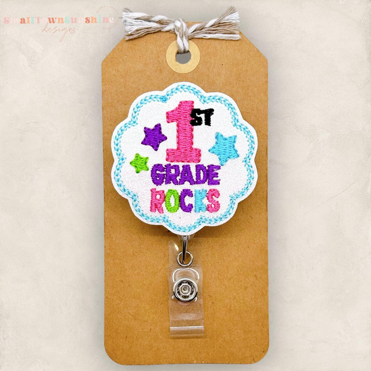 first grade rocks, 1st grade teacher embroidered badge reel