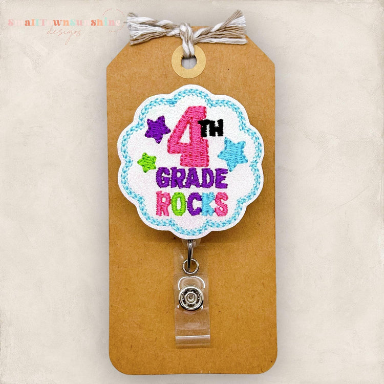 4th grade rocks embroidered badge reel