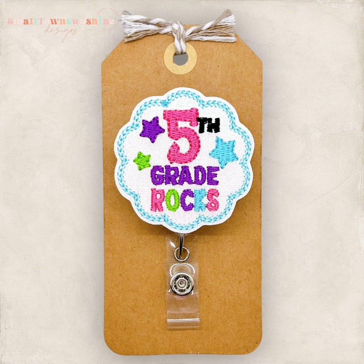 5th grade rocks embroidered badge reel