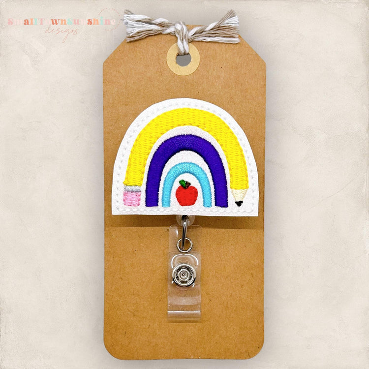 pencil and apple school rainbow badge reel