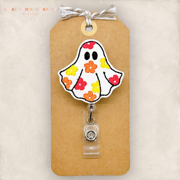 ghost with embroidered flowers in fall colors badge reel