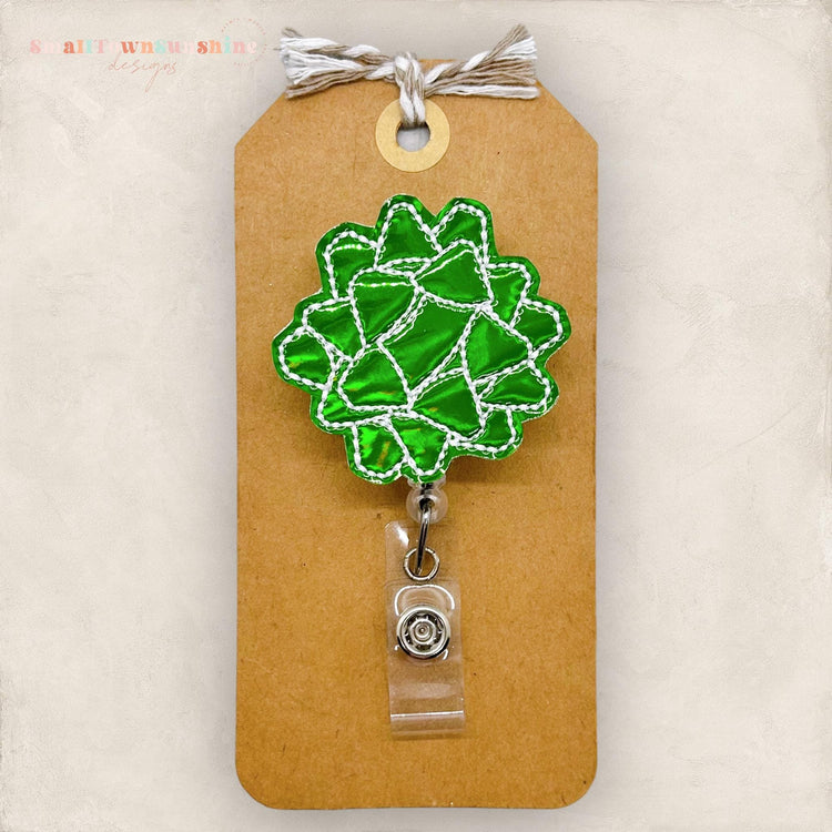 Green Christmas Present Bow Badge Topper
