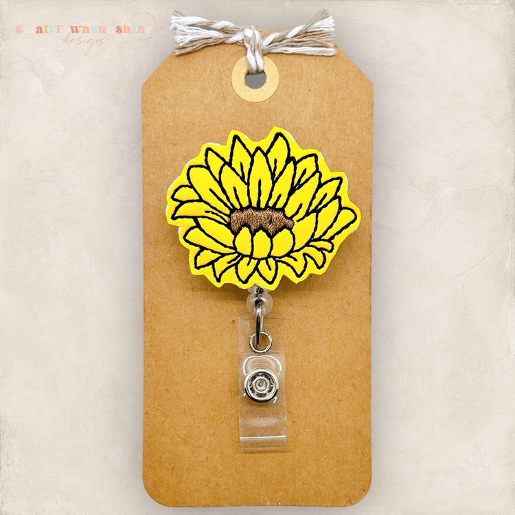 open sunflower embroidered badge reel