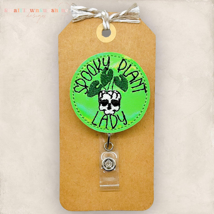 skull planter badge reel, spooky plant lady
