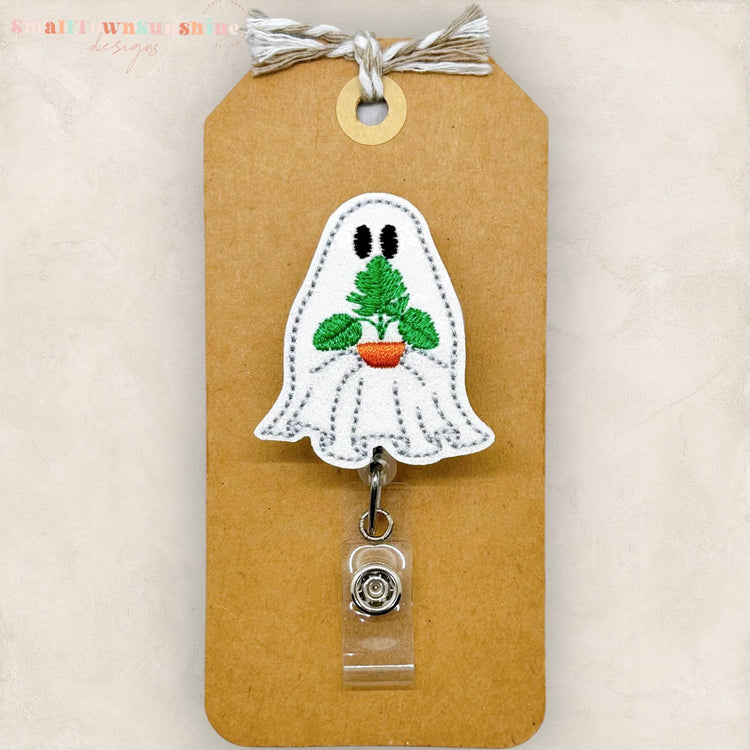 ghost holding a plant embroidered badge reel topper