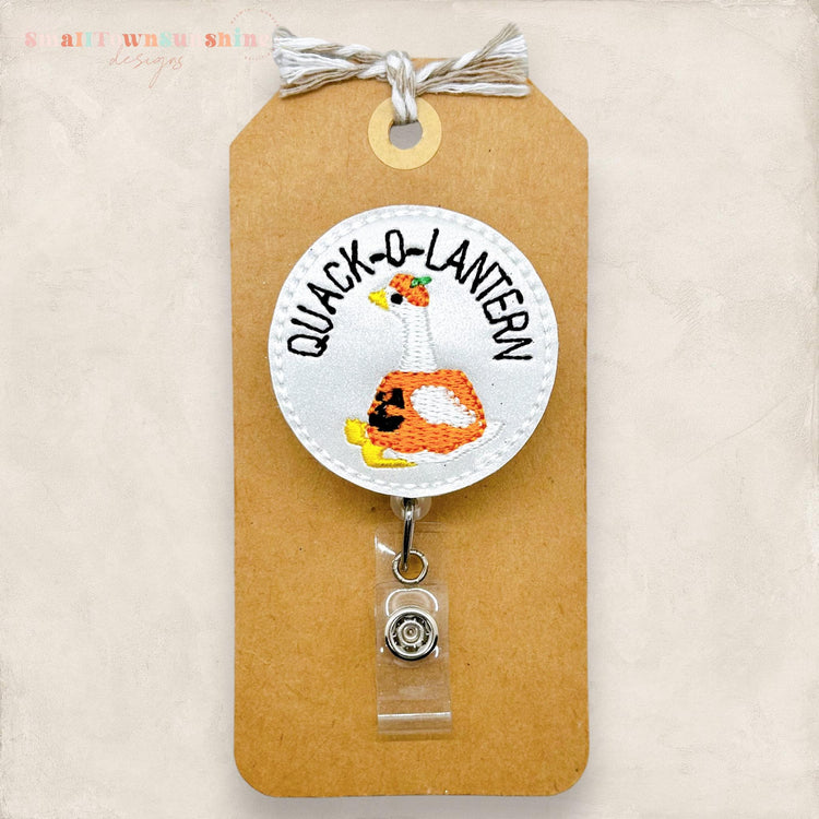 silvery quack o lantern embroidered badge reel