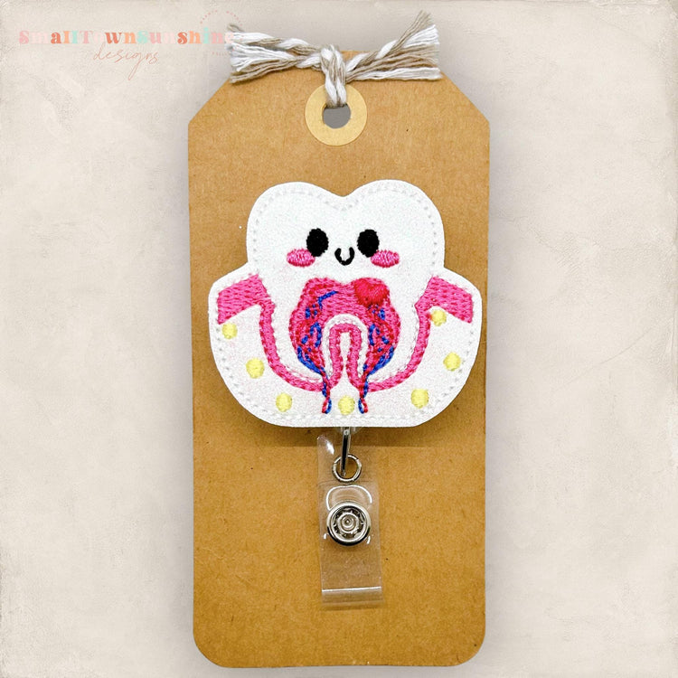 anatomy of the inside of a tooth badge reel