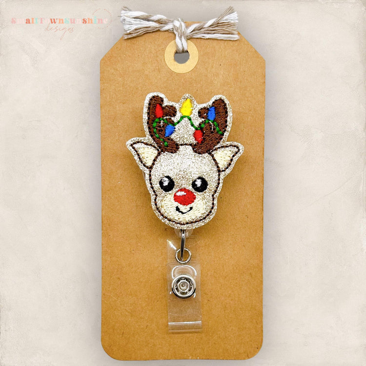 reindeer face with lights in the antlers embroidered badge reel