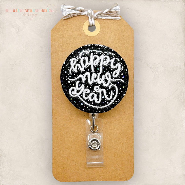 festive vinyl happy new year embroidered badge reel