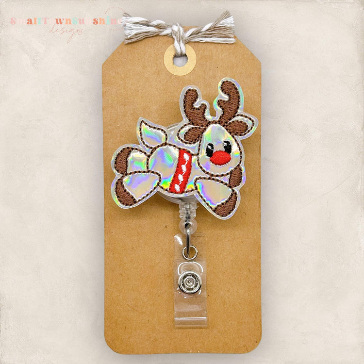 holographic embroidered flying reindeer badge reel
