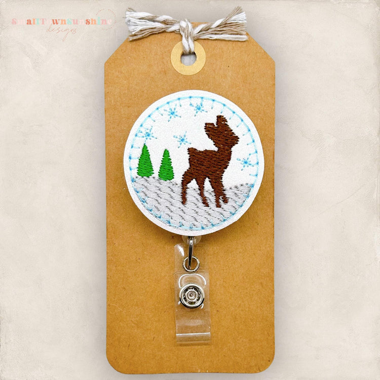 snowy winter deer scene embroidered badge reel topper