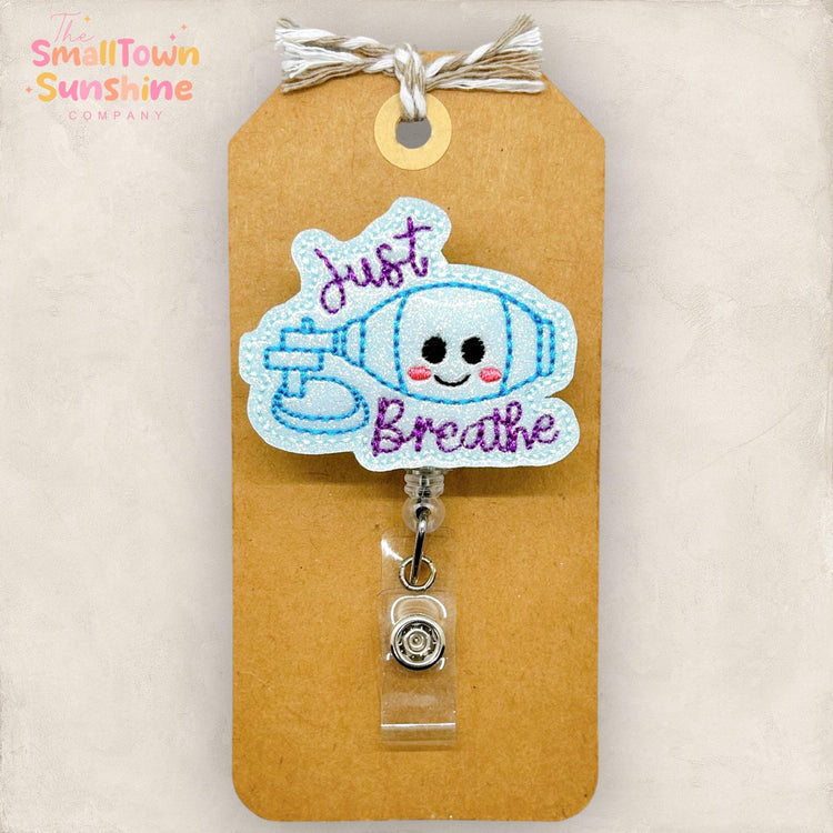 ambu bag embroidered badge reel topper