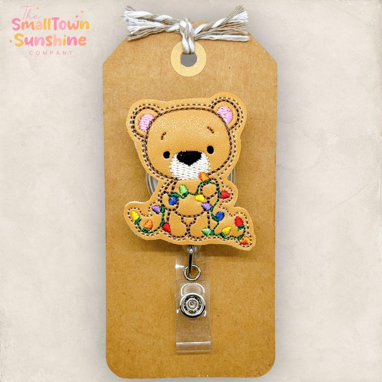 embroidered brown teddy bear with christmas lights