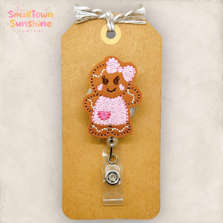 gingerbread cookie girl with pink bow embroidered badge reel topper