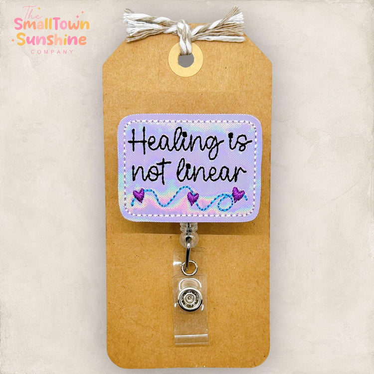 healing is not linear embroidered badge reel topper