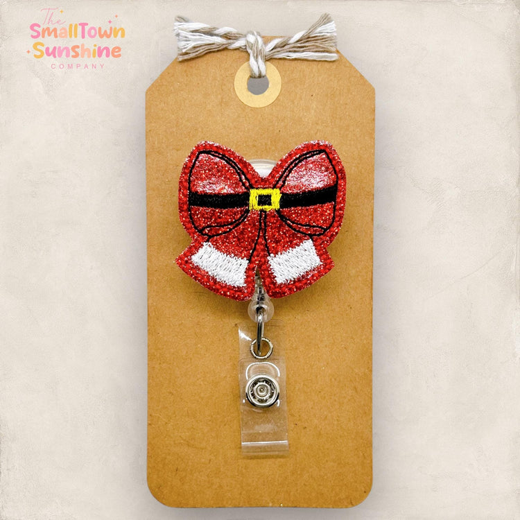 embroidered red santa bow badge reel topper