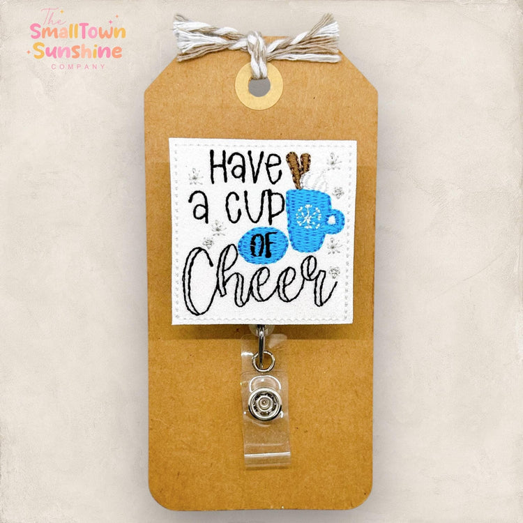 have a cup of cheer with winter mug with whipped cream and cinnamon sticks