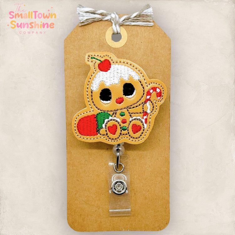 cute baby gingerbread cookie with red and green candy