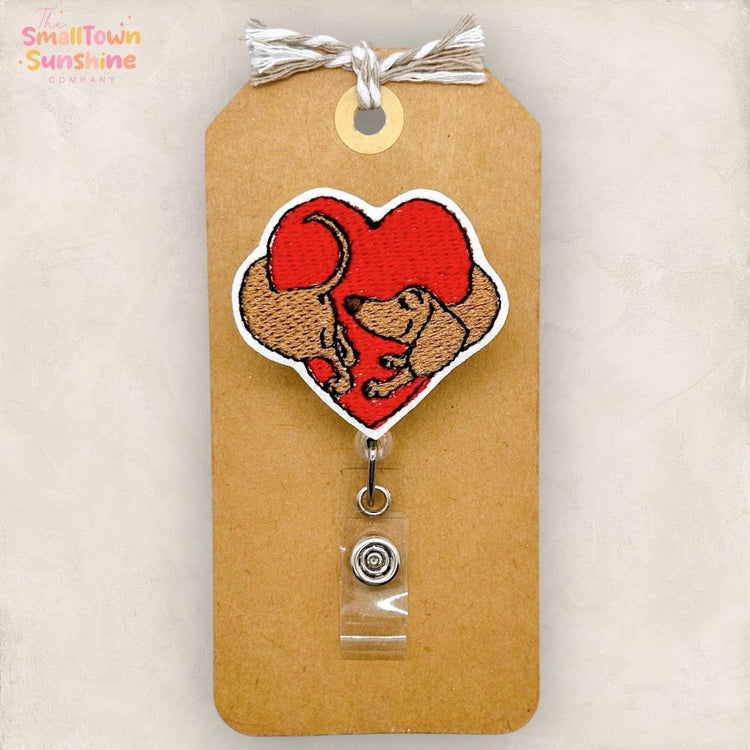 weenie dog hugging heart badge reel topper