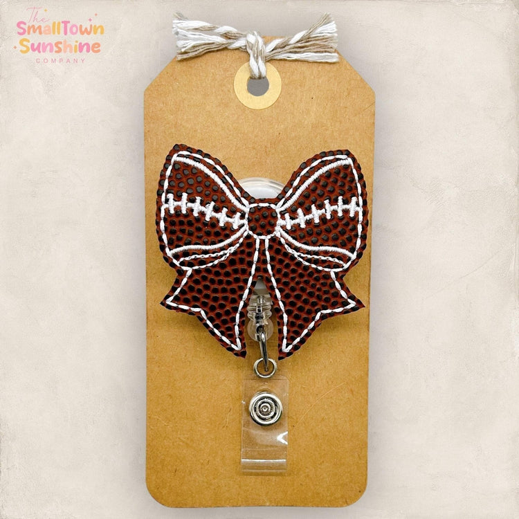 embroidered football bow badge reel topper