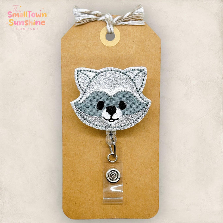 embroidered raccoon face badge reel topper