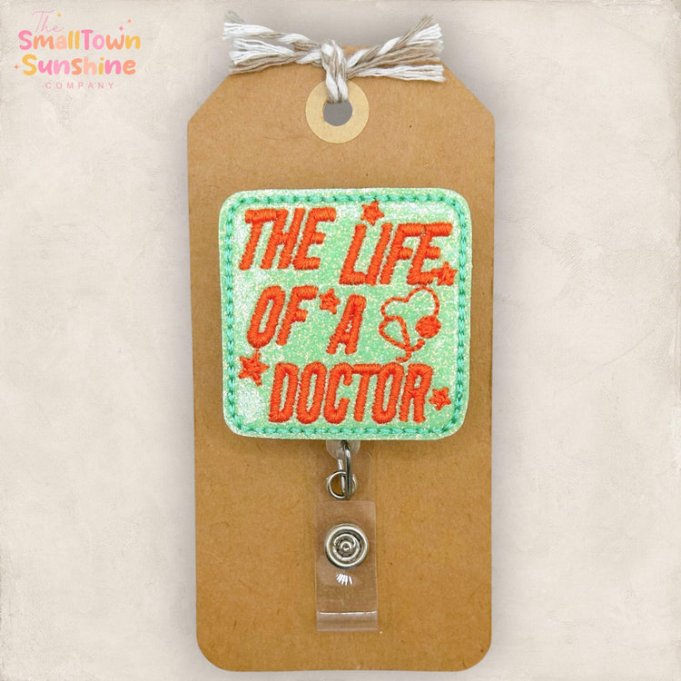 The Life of a Doctor Retractable Badge Reel: ID Holder, Name Tag, Swappable Topper, Coworker Gift, Lanyard, MRI Safe, Heavy Duty | GLITTER