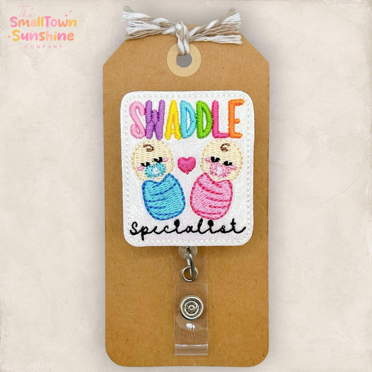 Swaddle Specialist Retractable Badge Reel: ID Holder, NICU, Baby Nursery, L & D Nurse Badge Clip, Coworker Gift, Name Tag, Topper | GLITTER
